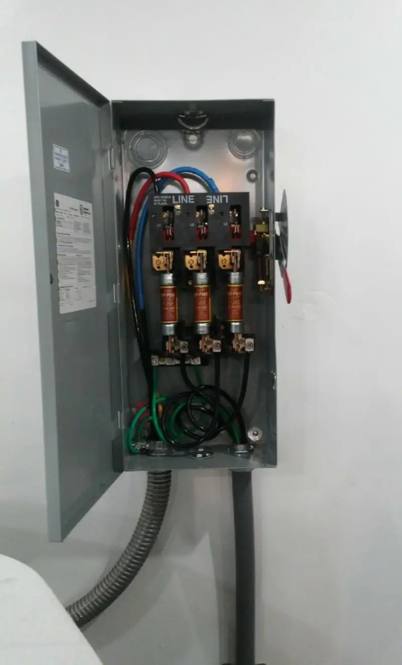 Three-phase disconnect switch installed for Smoke Detector Installation in Broadmoor